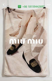 Miumiu Throw Blankets